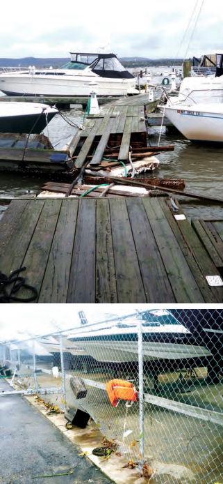In the marina, docks broke loose when they were lifted above their pilings, above, but the boats attached to them in general fared quite well and suffered little damage. An assortment of debris lodged in the boatyard fence, below, shows the height the water reached.