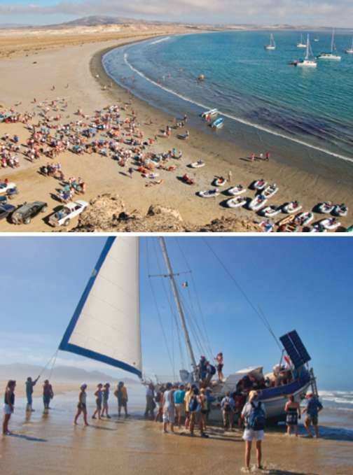 At the Ha-Ha’s first stop, Turtle Bay, rally participants gather for the shore party, top of page. A less fortunate non-participant’s cruise ended on the beach off Bahia Santa Maria, at right.