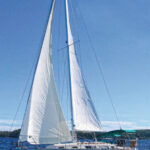 Fred and Vicki Meade sail their Sabre 32, Trilogy on Lake Champlain. The Sabre 32 is a handsome boat with conservative lines that have never gone out of style.