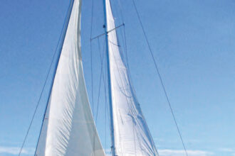 Fred and Vicki Meade sail their Sabre 32, Trilogy on Lake Champlain. The Sabre 32 is a handsome boat with conservative lines that have never gone out of style.