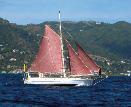 Jadie is a steel gaff-rigged cutter built by Martin and Leslie Klein in Namibia. She has sailed Caribbean waters since the late 1990s. She has no roller furling and sets a variety of small sails, all easily handled by even the smallest crewmembers.