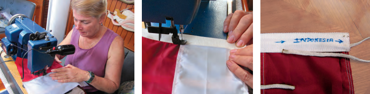 The field of the Indonesian flag is two horizontal color bars, so the first step in making the flag is to sew them together, at left. The webbing reinforcement at the hoist carries the tension in the halyard, center. Marcie marks her flags so she will always hoist them right side up, at right.