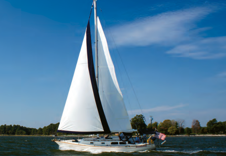 Under reefed mainsail and partially furled genoa, the Cal 39 Mk II, Boomerang, owned by Charles and Gina Strasburger of St. Michaels, Maryland, struts her stuff on Chesapeake Bay.