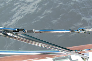 By replacing the swaged studs of the wire lifelines with toggle studs, David reused the original turnbuckles with the new Dyneema lifelines.