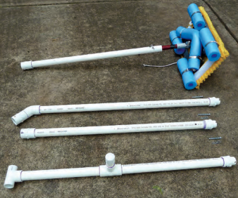 To make his hull cleaner easier to transport and store, Ferman cut the PVC pipe handle into short lengths. He joins them together with screwed connections.