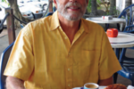 A man sitting at a cafe