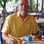 A man sitting at a cafe
