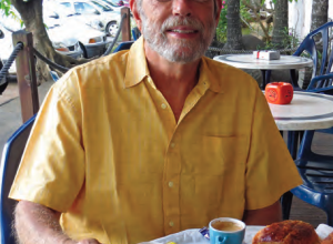 A man sitting at a cafe
