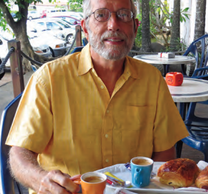 A man sitting at a cafe