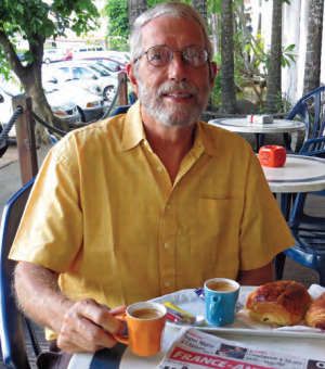 A man sitting at a cafe