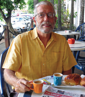 A man sitting at a cafe