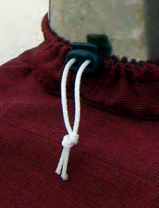 The cord lock on the drawstring holds the collar snugly around the Dorade vent.