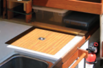 David’s water “tank” makes practical use of an otherwise dead space in the galley.