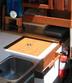 David’s water “tank” makes practical use of an otherwise dead space in the galley.