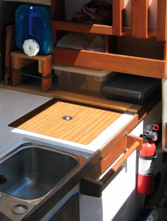 David’s water “tank” makes practical use of an otherwise dead space in the galley.