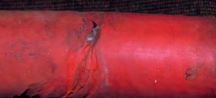 The raw-water supply hose to the engine was chafed almost through where it passed through the bulkhead.