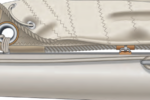 The simplest outhaul, on facing page, is a line led from the clew of the sail around a cheek block on the end of the boom and to a cleat (or a cam cleat) farther forward on the boom.