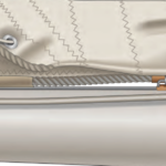 The simplest outhaul, on facing page, is a line led from the clew of the sail around a cheek block on the end of the boom and to a cleat (or a cam cleat) farther forward on the boom.