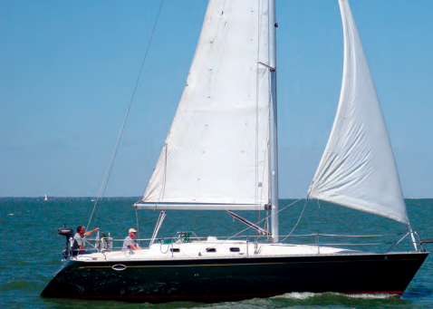 The dark green hull of Irish Rover, owned by Ted and Lynn Ambers of Polk, Ohio, shows off the sleek, aggressive lines of the Hunter Legend 37.