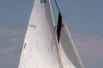 Finesse, Richard Beard’s Alberg 35, and the photo boat, Paul West’s Valiant 32, Bluebonnet, both took their lumps on breezy Galveston Bay.