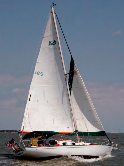 Finesse, Richard Beard’s Alberg 35, and the photo boat, Paul West’s Valiant 32, Bluebonnet, both took their lumps on breezy Galveston Bay.