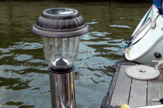 The garden lights drop into the fishing-pole holders for sailing.