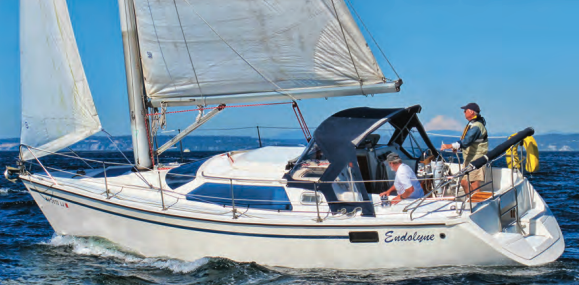 Showing off her rakish lines, Endolyne, above, a Hunter Vision 32 owned by Jeff Carey, stands up to a 20-knot breeze.