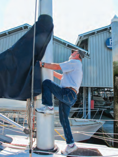 Two steps are fitted on the mast to allow crew to reach the mainsail’s halyard shackle and work with the sailcover.
