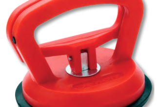A dent puller grips the curved surface of a boat’s hull firmly and releases easily.