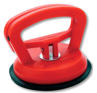 A dent puller grips the curved surface of a boat’s hull firmly and releases easily.