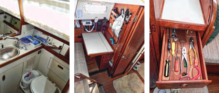 The head is nicely trimmed in teak and the white laminate surfaces make it bright, at left. Its location aft near the companionway is unusual on a boat of this size. The nav station is at the head of the quarter berth, center. The bi-fold door provides some privacy in the aft cabin. The dedicated tool drawer, at right, is a Sabre trademark and a nice touch.
