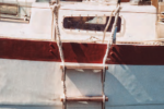 Richard transformed a plank retrieved from the harbor and a couple of lengths of three-strand rope into a practical and effective ladder.