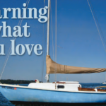 Occam’s Razor, a Sailstar Corinthian, tugs at her mooring after Kegan successfully restored her to sailing condition.