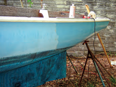 It took considerable elbow grease to buff her oxidized gelcoat back to its original powder blue.