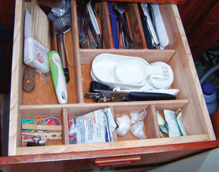 Drawer contents can quickly get shuffled on a moving boat but custom organizers keep everything in place.
