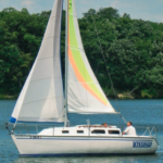 Alex Krinickas and his wife, Barbara Morris, have owned and sailed their Santana 2023, Windego, for 18 years.