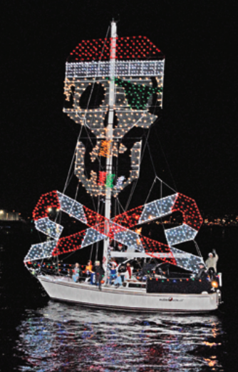 Picture of a boat with christmas jolly roger lights