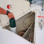 A self-draining anchor locker is a ready-made location for a quick-and-easy storage container for propane canisters.
