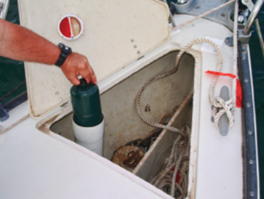 A self-draining anchor locker is a ready-made location for a quick-and-easy storage container for propane canisters.