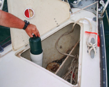 A self-draining anchor locker is a ready-made location for a quick-and-easy storage container for propane canisters.
