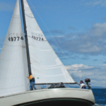 With the mainsail and genoa drawing well, Greg Pearson’s S2 9.2A, Blast, moves quickly upwind on the gray waters of Puget Sound.
