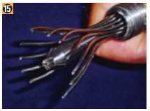 Slide the wedge over the wire core and carefully re-lay the strands.