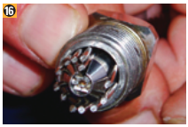 In this poor assembly, a strand is lodged in the slit in the wedge.