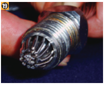 Unscrew the terminal end and examine the assembly for uniformity.