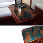 Patina copper and bar top epoxy created an interesting effect on the tabletop, a bit like a map that unfolds, below.