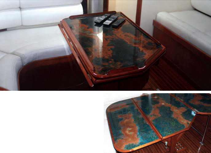 Patina copper and bar top epoxy created an interesting effect on the tabletop, a bit like a map that unfolds, below.