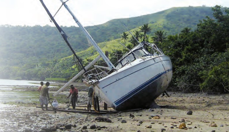 Cyclone Tomas threw a Hunter 41 onto a reef-bound shore in Fiji, where she was abandoned by her owners.