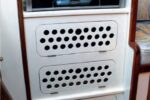 In a small galley, lockers are more useful than an oven.