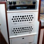 In a small galley, lockers are more useful than an oven.