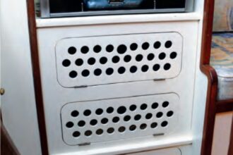 In a small galley, lockers are more useful than an oven.